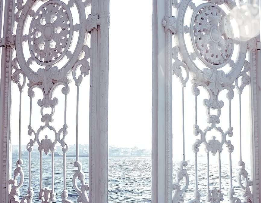 ornate gates with view of the sea